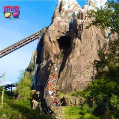 people are walking up and down the stairs at disney's animal kingdom