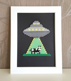 an image of a pixel art with a cow in the middle