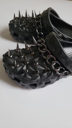 Gunmetal color spike croc charm/chains- Metal shoe charm- Spikes rivets shoe charm- Charms set for croc-Black Shoe Charm- Punk Shoe Charms Croc charms Hello everyone Welcome to my store I I offer you accessories that will make your shoes unique, attractive and irresistible. WARNING! Small parts. CHOKING HAZARD. Not for children under 3 years. Package: 1 set -Materials: stainless steel and alloys, plastic, glue.These shoe charms are made of plastic and metal, with silver plating. It has a smooth feel and is not easy to fade. These shoe charms can be matched at will, allowing you to match different unique styles. -Only shoes accessories sold, the shoes in the pictures are for display purposes only. -Suitable for shoes with holes. There are black buttons glued to the back of this product (I u Black Crocs With Spikes, Rocker High-top Boots With Spikes, Punk High-top Boots With Spikes, Alternative Lace-up Boots With Spikes, Edgy Lace-up Boots With Spikes, Spike Shoes, Punk Shoes, Croc Charms, Only Shoes