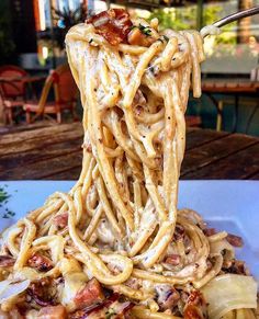 a fork full of noodles with bacon and other toppings