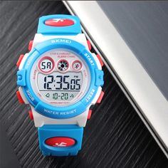 Colorful, stylish and trendy kids watches by SKMEI for 5 to 10 year olds They make the best kids watches as they are packed with functionality including stop watch, back light, shock resistance, repeater, auto date, LED display, chronograph, alarm, and complete calendar These kids waterproof watch can be worn while showering and swimming. They are 50M waterproof (5Bar). Please refrain from pressing any buttons while in water Great gift to tell little ones they are now a "big kid". Perfect for Ki Boys Watch, Best Kids Watches, Stop Watch, Auto Date, Boys Watches, Blue Words, Couple Pajamas, Pyjamas Womens, Back Light