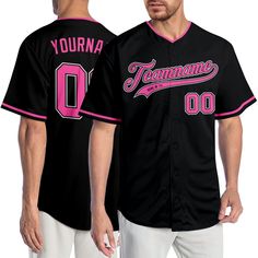 two baseball players wearing black and pink uniforms with the number 0 on it's chest