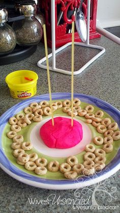 a plate that has some food on it and the words how many cheetos can you stack?