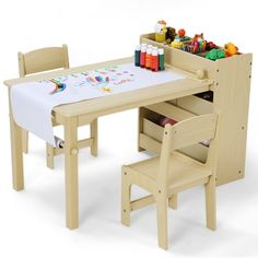 a child's wooden table and chair set