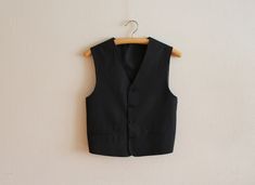 "Men's Vest Black Vest Black Striped Gentlemen's Vest Mens Waistcoat Wedding Classic Vest Formal Fitted Edwardian Victorian Renaissance Steampunk Baroque Small size No size label, estimated size small Measurements (lying flat): Length(back): 21\"/ 53.5 cm Chest(pit to pit): 18 1/4\"/46.4 cm Please check measurements to insure a proper fit. Remember to allow yourself some extra room for movement. You can compare these with something from your closet that fits you well. Condition: great Vintage Co Fitted Black Nehru Jacket For Business, Fitted Black Suit With Vest, Black Suits With Vest For Formal Occasions, Classic Black Suit With Vest, Classic Black Suits With Vest, Semi-formal Black Vest With Buttons, Black Sleeveless Suit With Vest, Classic Fitted Black Nehru Jacket, Black Nehru Jacket For Winter Formal