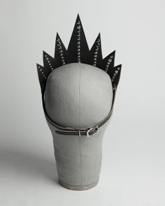 Dramatic spiked and studded crown headpiece made in thick pvc or leather. Fit is adjustable with buckle in back of head. Shown in black Horween Chromexcel leather. Silver toned nickel plated steel hardware. SMALL/MEDIUM fits 20-23" head size.MEDIUM/LARGE fits 22-25" head size.Custom sizing available. All pieces are MADE TO ORDER. If your measurements fall outside these standards or you are unsure of what size to order, select the closest size and include your measurements in the notes upon check Posture Collar, Horween Chromexcel, Crown Headpiece, Tiara Headpieces, Back Of Head, Oxblood Leather, Horween Leather, Light As A Feather, Tiara Crown