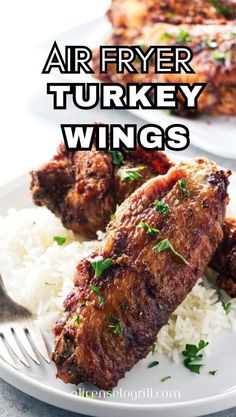 air fryer turkey wings with white rice on a plate