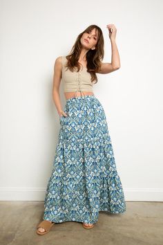 Tiered maxi skirt in an eye catching print.Fitted at waist, relaxed at the hip.100% cotton.Hand wash or dry clean Casual Cotton Maxi Skirt, Maxi Length Floral Print Bottoms For Day Out, Maxi-length Floral Print Bottoms For Day Out, Vacation Wide Leg Maxi Skirt With Floral Print, Beach Cotton Maxi Skirt, Cotton Maxi Skirt For Beach, Spring Cotton Maxi Skirt For Day Out, Flowy Cotton Maxi Skirt For Day Out, Cotton Maxi Skirt For Day Out