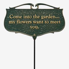 a sign that says, come into the garden my flowers want to meet you