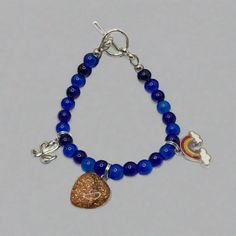 Today, bracelets have become an indispensable item of any person’s wardrobe. Cobalt Blue Bracelets 6mm beads with natural stone are in trend. A wide selection of stones allows you to choose a bracelet for any style. colbalt blue 6mm charms https://www.becsuejewelryshop.com/collections/charm-bracelets Blue Bracelet With Heart And Round Beads, Blue Polished Beads Bracelets For Gift, Blue Charm Bracelet With Heart Beads And Adjustable Fit, Adjustable Blue Charm Bracelet With Heart Beads, Blue Beaded Bracelets With 8mm Beads For Jewelry Making, Blue Polished Beaded Bracelets For Healing, Blue Lapis Lazuli Bracelets With Polished Beads, Blue Lapis Lazuli Beaded Bracelets, Nickel Free Blue Beaded Bracelets With Round Beads