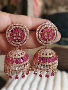 Cubic zirconia Ruby Color CZ Earrings with Mangtika/ CZ Ad Jhumki Earrings/ Bridal Jewelry Jhumka / Long CZ  earrings/ Crystal Earrings Ready to dispatch  Also features diamante cz work. Perfect match for them cocktail nights. High quality diamond simulant (Grade AAA), guaranteed to SPARKLE! Each stone is carefully prong set (not glued). Delicate & Elegant design that will make a statement on your special day. The design is distinctive & feminine - absolutely goes with everything. You will conti Earrings With Mangtika, Jhumka Collection, Black Sarees, Pastel Dresses, Antique Necklaces Design, Ruby Color, Jhumki Earrings, Vintage Backpacks