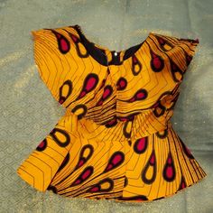 Such A Beautiful Piece It Will Go Great With A Nice Pair Of Blue Jean's. And A Pair Of Red Pumps. African Ankara, Red Pumps, Ankara Fabric, Blouse Shirt, Orange Red, Shirt Color, Color Orange, Ankara, Orange Color