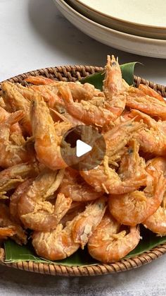 a plate full of fried shrimp on a table