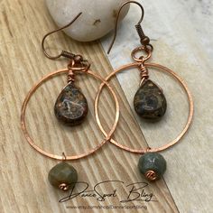 "♥ A B O U T - T H I S - D E S I G N -    These are Handmade Earrings from my Artisan Jewelry Collection - READY TO SHIP! Copper Hoop Earrings with a Leopard Jasper Teardrop bead inside the copper hoop, and a fancy Jasper rondelle bead suspended at the bottom of the hoop.  I lightly hammered the hoops for a shimmery effect.   They measure 2.5 \" long including the copper ear wires.  The large hoop is about 1 1/4\" in diameter.  For sensitive ears, you have the option to select Titanium or Rhodium ear wires. These gorgeous earrings will be great for work or play, and will make the perfect gift for that special lady in your life, i.e. Wives, Moms, sisters, daughters, and friends.  Great Valentine's Day Gifts, Mother's Day gifts, Birthdays, special occasion gifts.    The earrings pictured are Leopard Jasper, Fancy Jasper, Rustic Earrings, Teardrop Beads, Etsy Earrings Dangle, Copper Earrings, Sensitive Ears, Pure Copper, Gorgeous Earrings