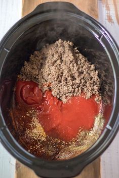 the ingredients are mixed together in the slow cooker to make meatballs and sauces