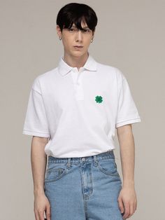 Editor's NotesThis is GRAVER's classic polo shirt embroidered with clover motif at the chest and it goes well with any bottoms. It's cut from cotton and poly-blend pique with soft touch. - Polo collar- Half placket with button fastenings- Graphic embroidery on the chest- Drop shoulder- Short sleeves- Relaxed fit- Unisex wear- Minimize distortion after washingMeasurements (in.) S / M / L- Total Length: 28.0 in. / 29.5 in. / 31.1 in. - Shoulder: 19.3 in. / 20.5 in. / 21.3 in. - Chest: 20.9 in. / 22.0 in. / 22.8 in.  - Sleeve Length: 8.3 in. / 8.7 in. / 9.1 in.  Model Info: - Man: 5' 10.1, 143.3 lbs / Fitting size L- Woman: 5' 5, 112.4 lbs / Fitting size SComposition & Care- 80% Cotton, 20% Polyester (20's)- Recommend separate wash at low temperature water using neutral detergent or dry c Casual Embroidered Cotton Polo Shirt, Casual Cotton Embroidered Polo Shirt, Embroidered Cotton Polo Shirt, Smile Embroidery, Graphic Embroidery, Polo Shirt White, Polo Collar, Embroidered Shirt, Polo Shirt