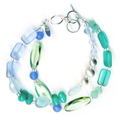 Inspired by my seaglass collection from days spent wandering island beaches, this bracelet is made from a mix of teal jade, freshwater pearls, ocean quartz, crystals & Czech glass, with an adjustable sterling silver toggle closure, size adjusts from 7" - 8" long. Salt Holder, Oyster Jewelry, Jewelry Dishes, Jewellery Showroom, Bracelets Handmade Diy, Golden Beach, Jewelry Studio, Quartz Crystals, Strand Bracelet