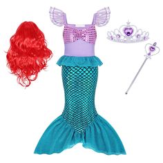 the little mermaid costume is ready to be worn with her red hair and tiara