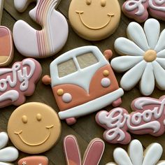 decorated cookies are arranged on a table