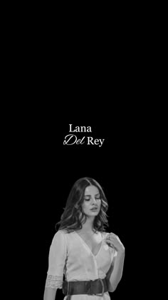 a woman standing in front of a black background with the words lana del ray on it