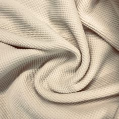 "This Thermal is 100% Organic Cotton. It is 60\" wide and weighs 240 GSM. This fabric stretches 50% in the width and 20% in the length. Soft thermal textured knit with a nice drape. Perfect for T-shirts, tops, lounge wear and children's apparel. Machine wash cool, no chlorine bleach. Line dry or tumble until dry. Shrinking is expected. Grown in the USA." Organic Cotton Fabric, Summer Fabrics, Textured Knit, Usa Today, Natural Fabrics, Natural Organic, Childrens Clothes, Shirts Tops, Bleach