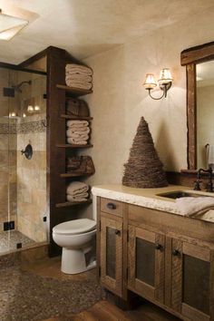 a bathroom with wooden cabinets and a white toilet