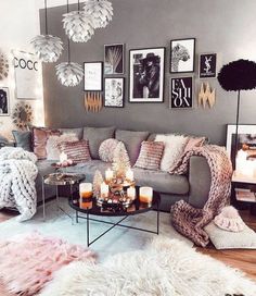 a living room filled with lots of furniture and pictures on the wall above it's coffee table