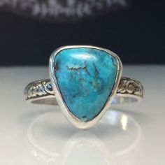 Trillion turquoise ring. Freeform turquoise silver ring. Artisan turquoise ring. Natural turquoise ring. Modern turquoise Ring. Beautifully unique trillion turquoise stacking ring, handcrafted of turquoise mined in the US. ❤️❤️ This ring is ready for immediate shipment in a size 11 - 11 1/2 and will be shipped out the next business day. ❤️ This stunning organic looking yet very versatile ring is available in any size with a very similar natural freeform stone measuring about 18mm's and set on a Morganite Engagement Ring Vintage, Jewelry Trending, Trending 2024, Rose Gold Engagement Ring Vintage, Diamond Eternity Wedding Band, Raw Stone Jewelry, Promise Rings For Couples, Topaz Engagement Ring, Fine Diamond Jewelry