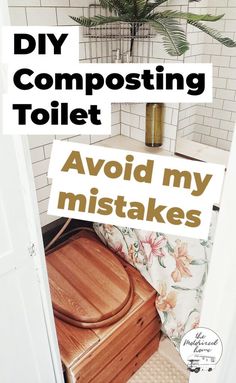 a toilet sitting next to a plant in a bathroom