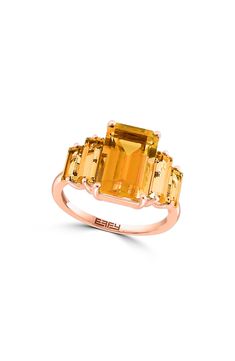 An elegant 14-karat rose-gold ring showcases five emerald-cut semiprecious stones for dazzling shine. Total semiprecious stone weight: 5.7ct. 14k gold/citrine or amethyst Made in the USA Michele Watches, Asscher Cut, Citrine Ring, Flip Flop Slippers, Winter Snow Boots, Keep Jewelry, New Handbags, Womens Jewelry Rings, Emerald Cut