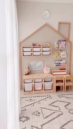 a child's playroom with toys and storage bins