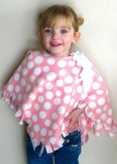 Toddler fleece poncho: This can be as simple as you want to make it! A fun no-sew project. No Sew Fleece Poncho, Poncho For Kids, Canvas Shoes Diy, Fleece Sewing Projects, Toddler Poncho, No Sew Fleece, Fleece Crafts, Fleece Projects, Fleece Poncho