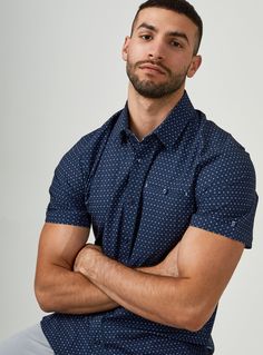 We created the perfect short sleeve button up, with the right mixture of comfort and style, just for you. Our performance shirts have 4-way stretch, are moisture wicking, wrinkle resistant and above all a great new addition to your wardrobe. The performance shirt will be your go-to for any occasion - day to night. This is a shirt that will have you satisfied at any given time. Details Model is 6'1" and wears a size medium. Care: Machine wash cold on delicate cycle with similar colors. Do not use Navy Short Sleeve Shirt With Buttons, Blue Short Sleeve Button-up Shirt With Placket, Blue Button-up Short Sleeve Shirt With Placket, Navy Cotton Button-up Short Sleeve Shirt, Navy Short Sleeve Relaxed Fit T-shirt, Short Sleeve Button Up, Mens Casual, Mens Casual Outfits, Lifestyle Brands