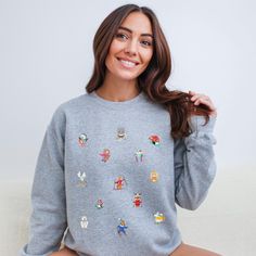 Get ready to hit the slopes in adorable style with our Cute Animal Ski Sweatshirt! This winter wonder showcases cute little animals hitting the slopes, adding a whimsical touch to your skiing adventures. Made from soft and cozy fabric, this sweatshirt is perfect for showcasing your love for both winter sports and charming critters. Embrace the snowy vibes with our playful and stylish Animal Ski Sweatshirt - where cute meets comfort on the slopes!Designed with a perfect blend of soft cotton and breathable polyester, this classic heavy-blend crewneck sweatshirt fits comfortably and is great for warm weather. The side seams are also stitched to prevent irritation. - Composed of a blend of 50% cotton and 50% polyester, creating a strong and smooth fabric ideal for printing - Medium-heavy fabri Casual Christmas Crew Sweatshirt, Casual Christmas Hoodie With Crew Neck, Casual Christmas Crew Neck Sweatshirt, Snowy Vibes, Ski Shirt, Ski Sweatshirt, Ski Shirts, Adorable Style, Christmas Pullover