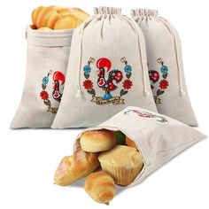 three bags with different types of pastries in them and one bag filled with bread