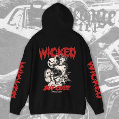 Wicked But Cute' Unisex Hoodie Halloween Graphic Print Hoodie For Streetwear, Black Emo Hoodie For Streetwear, Black Punk Hoodie For Alternative Fashion, Halloween Grunge Streetwear Hoodie, Black Emo Hoodie For Cosplay, Edgy Long Sleeve Halloween Hoodie, Gothic Black Hoodie For Streetwear, Black Edgy Hoodie For Alternative Fashion, Edgy Black Hoodie For Alternative Fashion