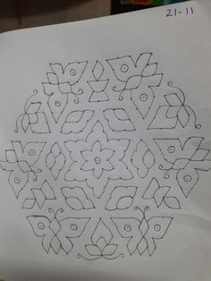 a piece of paper with an intricate design on it