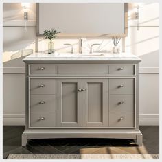 a bathroom vanity with two sinks and a mirror