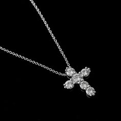 Forever One Moissanite Cross Necklace Gold Pendant Religious Symbol Christianity Six Stones The cross is one of the symbols, used by many religions, such as Christianity. In the end, the cross is the ultimate demonstration of God's power. Necklace is made of 14k white gold and contains shared prongs set forever one moissanites stones (1.75cttw). Cable, gold chain with lobster clasp is included with the price. We offer two different chain length: 16 inch and 18 inch. Dimensions: 19.5mm tall, 15mm Spiritual Cubic Zirconia Necklaces With Diamond Accents, Wedding Necklace With Diamond Cut Cross Pendant, Classic Cross Pendant Necklace With Prong Setting, Classic Necklaces With Cross Pendant In Prong Setting, Classic Cross Cubic Zirconia Necklaces, Wedding Cross Pendant Necklace With Diamond Cut, Classic Cross Pendant Necklaces With Prong Setting, Spiritual Diamond Necklace For Anniversary, Spiritual Cross Pendant Necklace For Formal Occasions