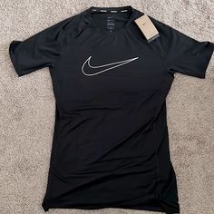 Nike Dri-Fit Training Shirt (Mens) Brand New. Never Worn. Black. Tight Fit. Move To Zero Sustainable Material. Nike Compression Shirt Men, Nike Fitted Sports Shirt, Nike Fitted Shirt For Sports, Fitted Nike Sports Shirt, Fitted Nike Shirt For Sports, Sporty Fitted Black Shirt, Black Fitted Sporty Shirt, Nike Fitted Graphic Print Top, Nike Fitted Top With Graphic Print