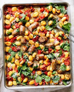 a pan filled with chickpeas and spinach