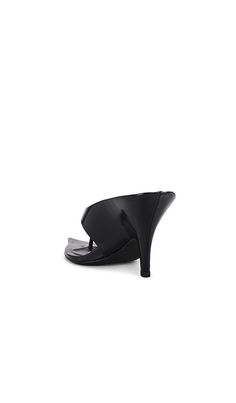 Find ALEXANDER WANG Irina 90 Pointy Toe Thong Sandal on Editorialist. Alexander Wang Irina 90 Pointy Toe Thong Sandal in Black. - size 37 (also in 36, 38) Alexander Wang Irina 90 Pointy Toe Thong Sandal in Black. - size 37 (also in 36, 38) Cow leather upper with leather sole. Made in China. Slip-on styling. Sheep leather footbed and lining. Thong design. Pointed toe with molded heel. Approx 90mm/ 3.5 inch heel. AWAR-WZ171. 30324S024. Alexander Wang adds measured depth to his signature tough-sexy Sleek Summer Kitten Heels With Heel Loop, Toe Post Heels For Night Out, Modern T-strap Heels For Summer, Designer Kitten Heels With Branded Heel Counter, Designer Summer Kitten Heels With Pointed Toe, Designer Summer Party Kitten Heels, Designer Kitten Heels With Pointed Toe For Summer, Designer Toe Post Sandals, Fitted Toe Post Sandals For Evening