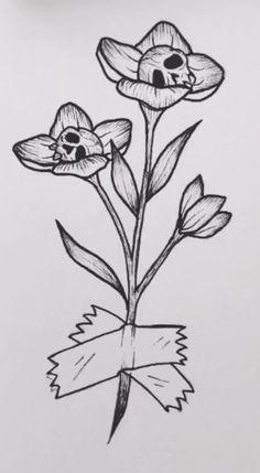 a drawing of three flowers on a white paper