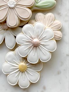 cookies decorated with flowers on a table