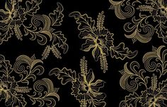 a black and gold floral pattern with swirls