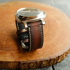 This Panerai Watch Band is made from premium cowhide leather which is done by hand on every single stages ,with traditional way to create strap. Include Buckle ( available Silver or Black color ) Strap : Material : Genuine Premium Leather, The Patina will develop in the leather during wearing time The leather is soft and very comfortable, no need break in period. Stitching and edge color can be changed on request. Thickness : For Panerai strap around 3.5 - 4 mm Our Strap Measurement : - 110/65mm Brown Leather Strap For Round Dial Watches, Adjustable Leather Watch With Stainless Steel Clasp, Leather Watches With Bracelet Strap And Round Dial, Leather Bracelet Strap Watch With Round Dial, Leather Watches With Stainless Steel Clasp For Daily Wear, Leather Watches With Stainless Steel Clasp For Everyday Use, Leather Watch Bracelet Strap With Round Dial, Adjustable Leather Watch Band With Stainless Steel Clasp, Brown Watch Bracelet Strap With Round Dial