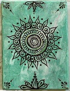 an artistic painting with black ink on green paper