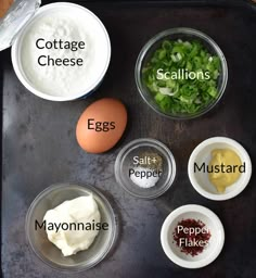 eggs, mayonnaise, scallions and other ingredients on a tray