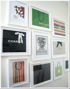 there are many pictures on the wall with bags hanging from it's sides,