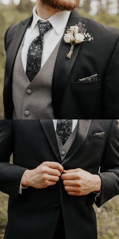 a man wearing a suit and tie with flowers on his lapel, standing in the woods